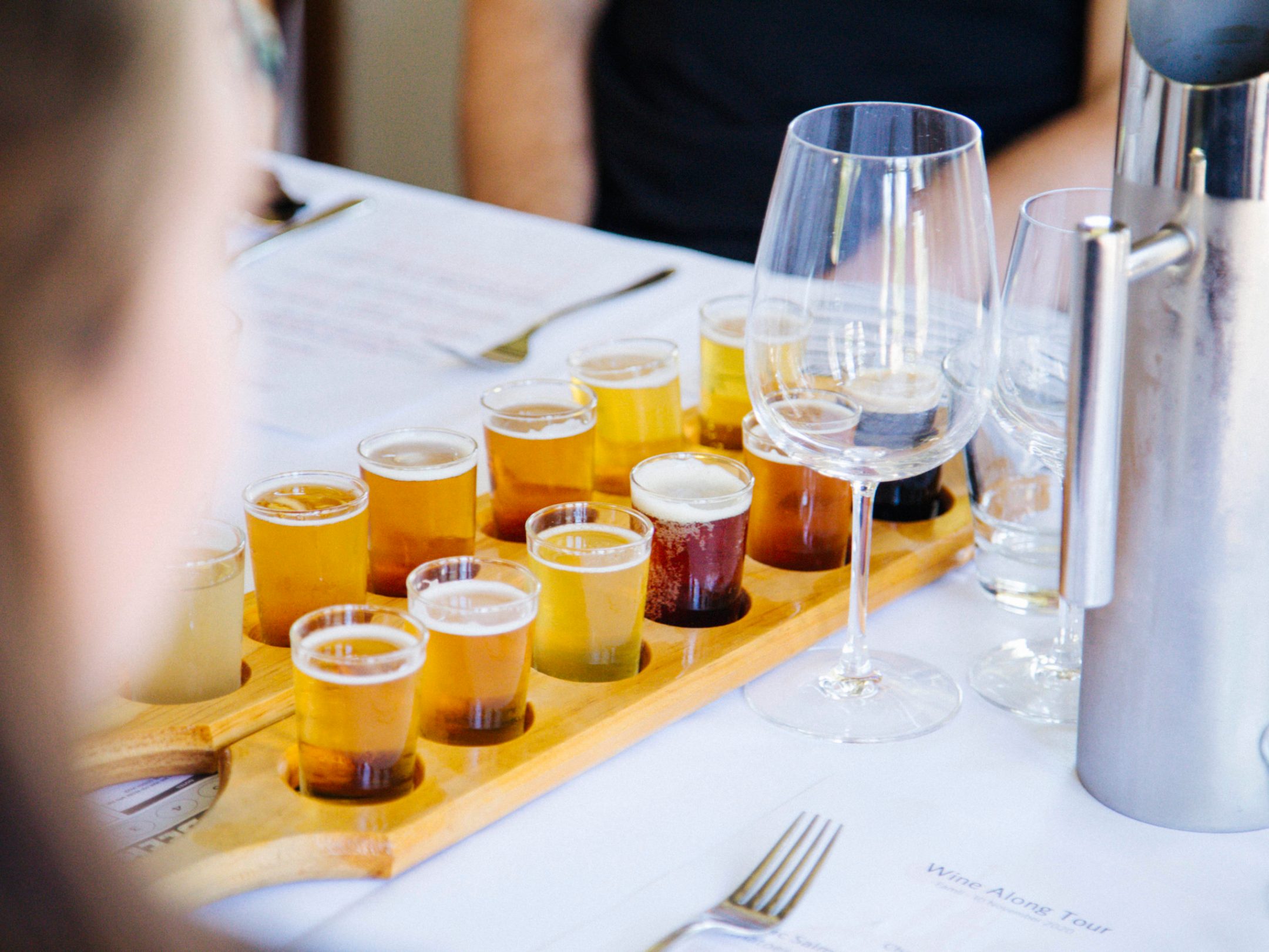 A paddle of beer on the table