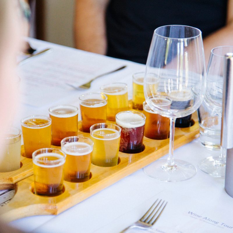 A paddle of beer on the table