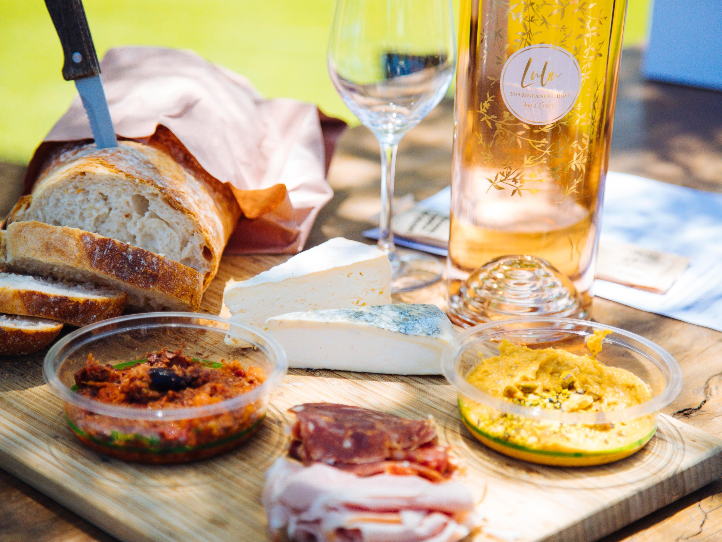 a glass of wine on a table