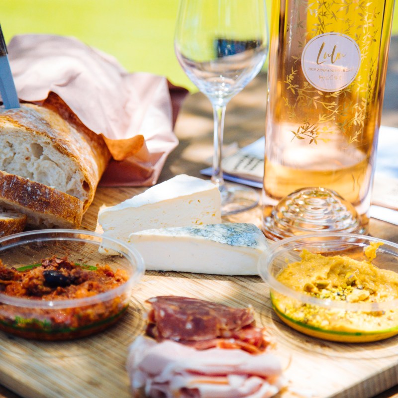 a glass of wine on a table