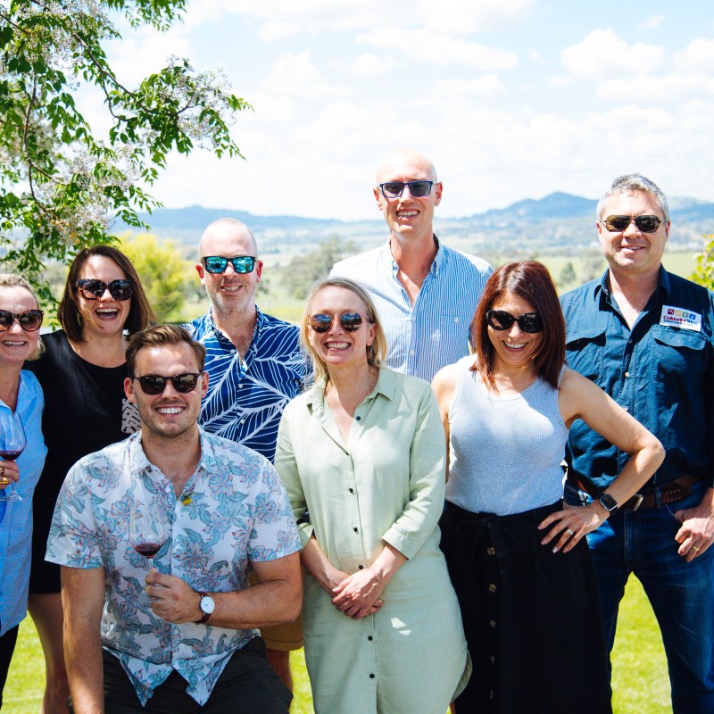 a group of people posing for a photo