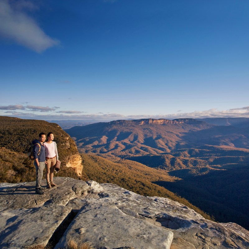 a man standing on top of a mountain